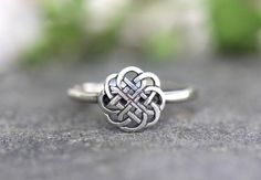 This listing is for one sterling silver dainty Celtic Knot ring with an intricate celtic knot center piece. Wear this Celtic ring solo or stacked with other cute stacking rings. - Choose your size at check-out.- Celtic Knot measures 5mm by 5mm. - Ring band is 1mm.Enjoy!Check out more stacking rings here:https://www.etsy.com/shop/DeerGirlDesigns?section_id=17967071Not sure of your ring size? Purchase one of these easy-to-use and super handy ring sizers:https://www.etsy.com/listing/536012303/ring-