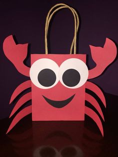 a paper bag with a crab on it