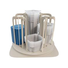 a stack of plastic cups and plates in a holder