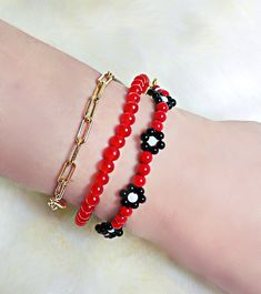 Hello guys!  BTS V Kim Taehyung Inspired Bracelets. Beautifully handcrafted just for you guys. If love the style of his bracelets you can purchase the whole set or separately.  Materials: 1. Beaded Red and Black Flower Bracelet: Red tiger eye- Beads Size: 3mm, 2mm, 4mm. Closure: Lobster Claw, Chain Extender 18k real Gold filled.  2. Chain link Bracelet - 3*9mm. Bracelet length: 5 inches, 6 inches, 7 inches Material: 18K Pure gold filled. High Quality, Non tarnish, Allergy free. 3. Chain Bracelet Trendy Red Bracelets For Party, Casual Red Bracelets For Party, Casual Red Beaded Chain Jewelry, Trendy Red Beaded Chain Jewelry, Trendy Red Bracelets With Colorful Beads, Trendy Red Beaded Bracelet With Letter Beads, Trendy Red Beaded Bracelets With Colorful Beads, Trendy Red Handmade Beaded Bracelets, Red Bracelets With Letter Beads