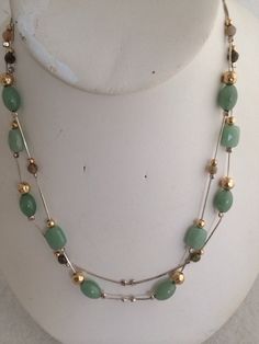 "Genuine Aventurine Sectional Beaded Double Snake Chain Sterling Silver 925 Hammered Accent Gold & Silver Beads stunning Necklace Smokey glass and gold bead accents Marked 925 = Sterling Silver Measures length - each chain measures approx 16\"Free Shipping on orders over $35.00 however if there is a return buyer to refund seller for the free shipping cost to seller." Gold Aventurine Beaded Jewelry, Silver Aventurine Round Beads Jewelry, Elegant Aventurine Beaded Necklaces With Polished Beads, Elegant Aventurine Beaded Necklace With Polished Beads, Aventurine Beaded Necklace With Faceted Beads, Silver Jade Jewelry With Faceted Beads, Stunning Necklace, Snake Chain, Gold Beads