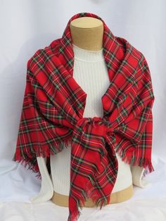 Very popular at Christmas, this blanket scarf in Royal Stewart tartan makes a great accent to your outfit or our Christmas photos. This over size scarf makes an excellent give for the ladies on your list who like to dress in current fashion. You can not go wrong with giving this Royal Stewart plaid over size scarf as a gift to a co worker at the office.Be practical and wear this to keep out the brisk breeze or use it to dress up your outfit. This big 56" x 56" polyviscose tartan scarf has 2" fri Scottish Plaid Winter Scarf, Tartan Blanket Scarf, Air Force Families, Stewart Plaid, Royal Stewart Tartan, Stewart Tartan, Tartan Blanket, Outdoor Wedding Photos, Tartan Scarf