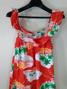 Hilo Hattie Hawaiian Muumuu Maxi Dress, Palm Trees, Red, Floral, XS, Vintage, Sleeveless, SummerSize XS. Measures approx. 18" pit to pit and 48" length.Looks great! Red Sleeveless Cotton Sundress, Sleeveless Dress With Tropical Print For Holiday, Tropical Sleeveless Dress With Ruffles, Red Ruffled Sleeveless Sundress, Red Sleeveless Summer Sundress, Hawaiian Sleeveless Dress With Tropical Print, Sleeveless Hawaiian Dress With Tropical Print, Red Hawaiian Dress For Spring, Red Cotton Sundress For Vacation