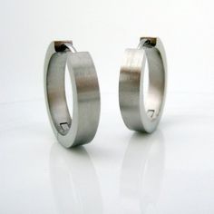 Men's extra large stainless steel hoop earrings.  These men's earrings are 19mm in diameter and 4mm wide.We have all sizes available from XS, S, M, L, and XL.Metal: stainless steelOuter Diameter: approximately 19mmWidth 4mm (Extra Large)Inner Diameter: approx 15mmShop policy http://www.etsy.com/shop_policy.php?Learn about the good quality of stainless steel jewelryhttp://360jewels.blogspot.com/2009/12/why-stainless-steel-jewelry-works.htmlThank you for your interest in our men's XL steel hoop ea Modern Small Hoop Stainless Steel Earrings, Modern Silver Hoop Earrings In Surgical Steel, Modern Silver Surgical Steel Hoop Earrings, Modern Hypoallergenic Stainless Steel Hoop Earrings, Minimalist Nickel-free Stainless Steel Hoop Earrings, Modern Small Hoop Stainless Steel Huggie Earrings, Modern Stainless Steel Small Hoop Huggie Earrings, Modern Stainless Steel Nickel Free Huggie Earrings, Modern Stainless Steel Huggie Jewelry