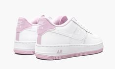 The Nike Air Force 1 Low returns with yet another awesome colorway of the iconic silhouette—this time, in kids sizing.  A pastel update for fans of white sneakers, the low-profile Air Force 1 features light pink highlights on the heel, collar, and tongue label.  On the lower half, a corresponding light pink sole completes the look and juxtaposes nicely with the all-white leather up top.  Nike Air branding appears on the tongue, heel, and midsole. Lilac Shoes, Pink Highlights, Top Nike, Casual Sneakers Women, Pink Nikes, Nike Air Force 1 Low, Stadium Goods, Nike Kids, Air Force 1 Low