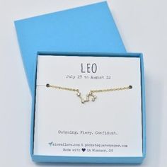 the leo zodiac bracelet is in its box