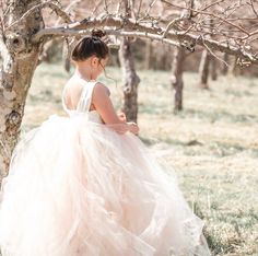 "This modern yet classic tutu dress features a lined ivory satin sleeveless bodice with a peach blush and ivory blend tulle skirt to yield this lovely blush color. The back of the dress bodice is stretchy for a custom, yet versatile, comfort fit. We can change these colors! WANT A SEWN IN SLIP TO LINE THE TUTU? https://www.etsy.com/listing/125566641/add-a-slip-to-the-tutu-dress-sewn-in?ref=shop_home_active_2 At checkout, please give us the following information: HOW TO ORDER: IMPORTANT We recomm Spring Princess Dress With Fitted Bodice For Bridesmaid, Spring Princess Dress With Fitted Bodice And Tulle, Spring Bridesmaid Ball Gown Tutu Dress, Bridesmaid Tutu Dress With Fitted Bodice And Tulle Skirt, Sleeveless Tulle Tutu Dress For First Communion, Spring Wedding Tutu Ball Gown, Tulle Tutu Dress With Fitted Bodice, Bridesmaid Ball Gown Tutu Dress With Tulle Skirt, Organza Tutu Dress With Tulle Skirt For First Communion