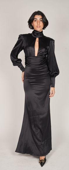 Introducing our exquisite Marcia Long Dress, the epitome of sophistication and grace. Crafted from the highest quality Italian silk, it exudes luxury and elegance. Boasting a high collar and full sleeves with delicate cuffs, this dress adds a touch of drama to any occasion, ensuring you stand out with timeless allure. For those extra special moments, such as weddings, this dress can be customized in White, offering a stunning option for the bride seeking refined beauty and charm. Elevate your style and leave a lasting impression with the Marcia Long Dress, the perfect choice for any elegant affair. Don't be a stranger. Call us, text us, email us and we will gladly help you find the perfect dress. Email: Trisha@trishapatersoncollection.com North America: 1-786-493-5496 EU (and rest of the w Hostess Dresses, Full Sleeves, Special Moments, High Collar, Full Sleeve, Perfect Dress, The Bride, North America, Long Dress