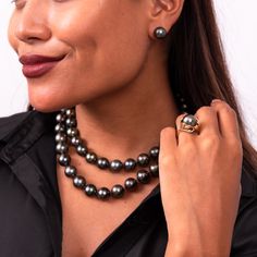 This large Tahitian Black Pearl is nestled in golden maile leaves. A unforgettable look that makes a massive statement. Black Pearl Jewelry, Black Pearl Ring, Peacock Pearl, Black Pearl Necklace, Hawaiian Jewelry, Tahitian Black Pearls, Gem Diamonds, Purple Pearl, Pearl Strands