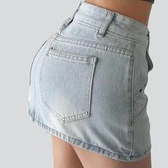 Make a statement with our ultra-short. medium-waisted. vintage-inspired denim skirt from the 2023 Summer Collection! This urban-trend staple is the perfect balance between contemporary fashion and '90s-inspired nostalgia. Crafted with premium quality denim. it features a unique distressed pattern and a reliable zipper and button duo.Why You'll Love It Grunge Galore: Embody the iconic '90s grunge movement with these effortlessly cool shorts. Distinctive Distressed Pattern: Expertly crafted wear a Trendy Mini Denim Skirt With Pockets, Y2k High Waist Cotton Skort, Trendy High Rise Mini Skirt With Pockets, Trendy Fitted Denim Skirt With Pockets, Trendy Fitted Jean Shorts For Streetwear, Trendy Mid-rise Denim Skirt With Pockets, Y2k Short Denim Skirt With Pockets, Fitted Denim Skirt With Pockets For Streetwear, Y2k Style Fitted Short Denim Skirt