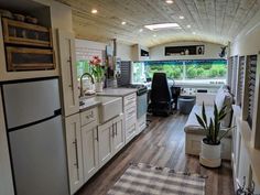 the kitchen is clean and ready to be used as a living room or dining area