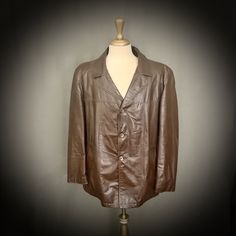 *ITEM DETAILS* - Era- 1970's - Brand- London Fog - Size- 46 Regular (please see the measurements for an accurate fit) - Material- Leather Acetate Lining Cotton/Poly Removable Lining - Made in Baltimore, Md *This item is in excellent vintage condition with no holes or stains.* *Shown here on a size 6-8 mannequin* *Measurements are taken while flat and doubled for the chest/waist* - Shoulders- 20.5 inches (across, seam to seam) - Chest- 46 inches (pit to pit, doubled) - Length- 29 inches from shou Retro Long Sleeve Leather Jacket For Work, Retro Brown Outerwear With Snap Buttons, Retro Vintage Brown Outerwear For Work, Vintage Leather Jacket With Snap Buttons, Vintage Leather Jacket With Lapel Collar For Fall, Retro Single Breasted Leather Jacket With Long Sleeves, Retro Single-breasted Leather Jacket With Long Sleeves, Retro Single-breasted Leather Jacket For Fall, Vintage Brown Retro Single Breasted Outerwear