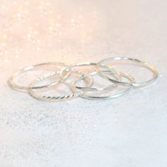 Minimalists rejoice over this dainty, sterling silver stacking ring. Smooth and shiny, made to order in your size! Any of our sterlings silver or gold stacking rings are just right for wearing alone, as a knuckle ring or as a set. This ring makes a lovely wedding band. This slim stacking band is also available in yellow gold or rose gold filled, or 14k solid yellow, rose or white gold (separate listings!). See additional links below for more metal options and ring styles. ►More stacking rings in Stackable Dainty Bands, Stackable Dainty Midi Rings, Dainty Stackable Midi Rings With Round Band, Stackable Dainty Midi Rings With Round Band, Dainty Stackable Open Midi Rings, Dainty Stackable Midi Rings, Dainty Sterling Silver Midi Rings, Minimalist Hypoallergenic Sterling Silver Stackable Rings, Hypoallergenic Simple Stackable Toe Rings