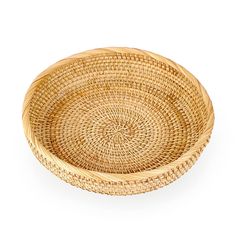 a round woven basket on a white background