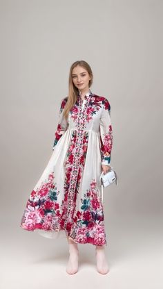 Elevate your style with the Flower Party Maxi Dress with Long Sleeve. This elegant abaya dress is perfect for any special occasion, featuring a long maxi silhouette and beautiful floral print design that exudes sophistication and grace. Whether you're attending a wedding, dinner party, or event, this dress is sure to make a statement.  Product Features:  - Long sleeve design for added elegance and modesty.  - Flowy maxi length for a glamorous look.  - Floral print adds a touch of femininity and charm.  - Made from high-quality materials for comfort and durability.  - Perfect for formal events or special occasions.  - Available in various sizes to accommodate different body types.  - Ideal for women who appreciate traditional and modern fashion. Elegant Long Floral Print Dress, Pink A-line Maxi Dress With Floral Print, Chic Floral Print Long Sleeve Maxi Dress, Chic Long Sleeve Floral Maxi Dress, Printed Maxi Dress For Wedding, Feminine Floral Maxi Dress For Party, Flowy Long Floral Dress, Elegant Long Floral Dress For Spring, Printed A-line Maxi Dress For Garden Party