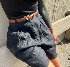 "Vintage high waist black 100 linen shorts Flattering and breezy; great quality you won't find in modern pieces with tightly woven midweight linen. Lined. Marked size small, fits estimated modern 25-27 depending on desired fit Excellent vintage condition, normal light wear with no significant flaws noted.  Measurements 13.25\" across waist lying flat 14\" rise 23.25\" across hips lying flat 6\" inseam 12.5\" across leg opening lying flat All items are sold as is with no returns and no partial re Black Bermuda Shorts With Belt Loops For Summer, Vintage Black Bottoms For Summer, Vintage Black Shorts For Summer, Black Vintage Summer Bottoms, Vintage Black Summer Bottoms, High Waist Vintage Shorts For Workwear, Vintage High Waist Shorts For Workwear, Vintage Workwear Shorts For Summer, Vintage High-waist Shorts For Work