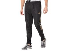 adidas Big Tall Tiro '21 Pants - Men's Casual Pants : Black/Gold : The primary materials that compose this product contain a minimum of 20 percent recycled content. Out playing a game or just kicking back on the weekend, these adidas Big Tall Tiro '21 Pants are perfect for any activity. These cotton-blend pants are constructed with an elastic waist, side pockets and the infamous triple stripes down the sides to keep you looking fresh. Pull-on track pants feature a regular, tapered fit, covered e Gold Pants, Mens Adidas, Mens Pants Casual, Infamous, Big & Tall, Pants Black, Men's Casual, Adidas Men, Track Pants