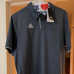 Adidas Climacool Drifit Tech Designed To Keep You Cool. Adidas Sporty Golf Polo Shirt, Gray Sporty Short Sleeve Polo Shirt, Gray Short Sleeve Sports Polo Shirt, Gray Short Sleeve Polo Shirt For Sports, Gray Short Sleeve Sporty Polo Shirt, Adidas Moisture-wicking Polo Shirt For Golf, Adidas Shirt Mens, Adidas Short, Gold Adidas