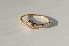 a close up of a ring on a white surface