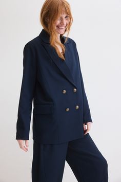 Are you ready to make a bold style statement while staying effortlessly chic? Look no further than our Boyfriend Blazer, a fashion-forward addition to your wardrobe that seamlessly marries the relaxed comfort of a boyfriend fit in classy navy. Double breasted button down Lapels and collar 2 side pockets Relaxed boyfriend fit Navy Button-up Blazer For Fall, Navy Blazer With Button Cuffs For Work, Chic Navy Blazer With Notch Lapel, Fall Navy Button-up Blazer, Tailored Spring Peacoat For Workwear, Chic Double-breasted Peacoat, Chic Navy Blazer For Business, Chic Navy Blazer For Business Casual, Chic Navy Outerwear For Business Casual