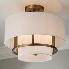 a light fixture hanging from the ceiling in a room