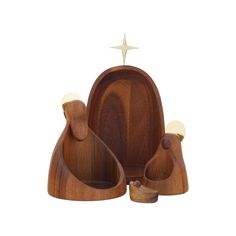 wooden nativity set with star on top