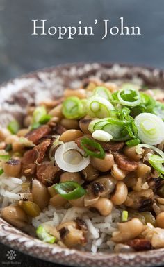 a bowl filled with rice and beans on top of a table