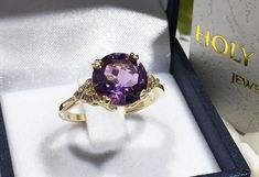 Don't miss this opportunity to own this beautiful gemstone ring crafted in 14k gold filled => Gemstone Type - Amethyst, Clear Quartz => Gemstone Cut - Faceted => Gemstone Size - 10 mm, 2 mm => Gemstone Shape - Round Shape => Total Number of Gemstones - 7 => Metal Type - 14k Gold Filled (Tarnish Resistant And Nickel Free) - also available in 925 sterling silver * Please contact me for pricing on a sizes larger than 11 * ~ Feel free to ask me about custom made designs. ❏ Replacem Yellow Gold Crystal Ring With Accent Stones, Gold Amethyst Ring With Accent Stones For Promise, Gold Amethyst Ring With Prong Setting For Promise, Gold Amethyst Promise Ring With Accent Stones, Gold Amethyst Round Cut Ring, Gold Amethyst Ring With Round Cut, 14k Gold Crystal Ring With Accent Stones, Gift Amethyst Ring With Vvs Clarity Round Cut, Oval Amethyst Ring With Vvs Clarity As Gift