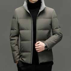 Elevate Your Winter Wardrobe With The Wenig Men's Fashionable Thickened Down Jacket, A Blend Of Style And Functionality Tailored For The Modern Man. This Jacket Is Generously Filled With High-Quality White Duck Down, Featuring An Impressive Fill Power Of 86% To 90%, Ensuring Superb Insulation And Warmth. Crafted Without A Hood For A Sleeker, More Business-Casual Aesthetic, The Main Fabric And Lining Of The Jacket Are Made From Premium Polyester Fibers. This Choice Of Material Contributes To The Half Zip Windbreaker, Triclimate Jacket, Mens Down Jacket, Cycling Jacket, Mens Black Jacket, Mens Windbreaker, Anorak Jacket, White Duck, Outdoor Jacket