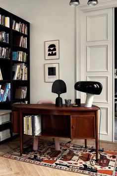 an open book with a desk and bookshelf in the corner on top of it