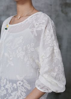 Handmade White Embroidered Cotton Shirt Top SummerFabric: Cotton BlendedSize & Fit: Fit: This garment fits true to size.Length: Size S measures 25.74"from shoulder to hemBust: Great for any cup size. Waist: Loose Fit. Comfortable room throughout midsection.Hip: Loose Fit - room for hips. Hand Wash Cold. Long Sleeve Shirt With Floral Embroidery And Relaxed Fit, Relaxed Fit Long Sleeve Shirt With Floral Embroidery, White Cotton Tops With Butterfly Embroidery, Summer Long Sleeve Blouse With Chikankari Embroidery, Summer Long Sleeve Chikankari Embroidery Blouse, Elegant Embroidered Tops With Relaxed Fit, Summer Long Sleeve Top With Chikankari Embroidery, Long Sleeve Blouse With Embroidered Hem Relaxed Fit, White Summer Shirt With Chikankari Embroidery