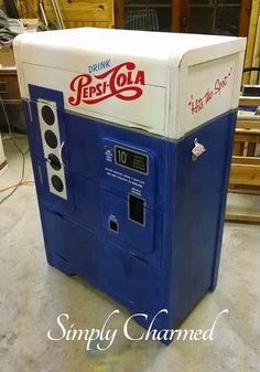 an old pepsi cola machine sitting on the floor