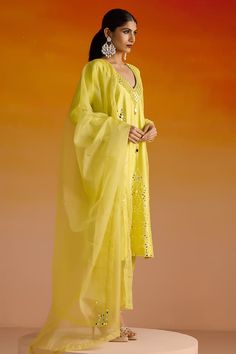 Yellow kurta with mirror and beads work hand embroidery. Paired with a matching plain pant with embroidered hemline and an embroidered dupatta. - Aza Fashions Festive Pant Set With Mirror Work And Straight Kurta, Festive Straight Kurta Pant Set With Mirror Work, Designer Mirror Work Straight Kurta Pant Set, Designer Straight Kurta Pant Set With Mirror Work, Designer Chanderi Pant Set With Mirror Work, Chanderi Sets With Mirror Work For Summer, Traditional Festive Pant Set With Mirror Work, Traditional Drape Pant Set With Mirror Work For Eid, Pant Set With Gota Work For Wedding Festivals