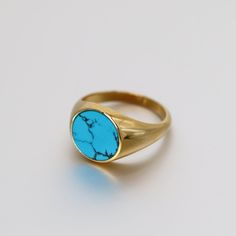 Handcrafted by Saints Gold Made to order allow 10 days to ship Solid gold signet flat ring available in 14K / 18K 14mm Natural Turquoise surrounded by solid gold 14K weight ranges from 8-10.2 grams 18K weight ranges from 10-12.2 grams 22k Gold Chain, Flat Ring, Platinum Chain, Flat Stone, Natural Turquoise Stone, 18k Gold Chain, Custom Bracelets, Natural Turquoise, Accessories Bracelets