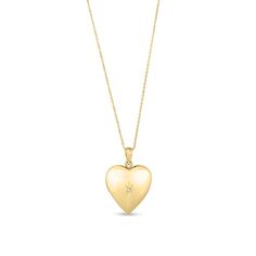 Your love shines in this darling diamond-touched heart locket pendant. Hollow 14K gold The hinged heart locket shines with a single diamond at the center The locket opens to reveal space for small photo or memento 1/20 ct. t.w. of diamonds 18.0-inch cable chain; lobster claw clasp Good Heart Locket, Jazmine Dubois, Good Heart, Small Photos, Heart Locket, Christmas Wishlist, Diamond Heart, Cable Chain, Lobster Claw