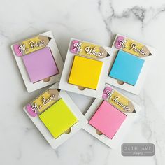 four different colored sticky notes are in a box on a marble counter top with the words mr and mrs written on them