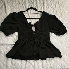 Dolan (By Anthropology) Puff Sleeve Blouse- Xs Black Silky Material In The Front And A Softer Material In The Back New With Tags Pet Friendly, Non Smoking Household. Bin 4 Chic Black V-neck Puff Sleeve Top, Spring Night Out Puff Sleeve Tops, Spring V-neck Puff Sleeve Top For Night Out, Feminine Puff Sleeve Tops For Night Out, Puff Sleeve Padded Blouse For Evening, Spring Night Out V-neck Puff Sleeve Top, Summer Puff Sleeve Blouse For Night Out, Chic V-neck Puff Sleeve Top For Party, Ruffled Puff Sleeve Tops For Date Night