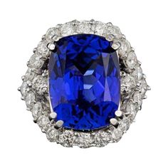 18.00 Carats Natural Very Nice Looking Tanzanite and Diamond 14K Solid White Gold Ring Total Natural Tanzanite Weight is: Approx. 15.50 Carats Tanzanite Measures: Approx. 16.00 x 12.00mm Natural Round Diamonds Weight: Approx. 2.50 Carats (color G-H / Clarity SI1-SI2) Ring size: 7 (free re-sizing available) Ring total weight: Approx. 11 grams Disclaimer: all weights, measurements and colors are approximate and may vary slightly from the listed dimensions or as seen in the image. All pictures are magnified to show the smallest of details. Please, refer to the item description for actual weight and size evaluation. SKU #PA24 1ct Diamond Ring, Tanzanite Stone, Tanzanite Diamond, Jewelry Appraisal, Tanzanite Ring, Etsy Gold Ring, Blue Sapphire Diamond, 18k Gold Ring, Natural Tanzanite