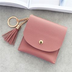 Brand Name: PURDOREDMain Material: PUOrigin: CN(Origin)Gender: WOMENMaterial Composition: PU leatherPattern Type: SolidStyle: FashionClosure Type: zipperUse: Credit CardModel Number: B70205Item Length: 10cmItem Type: Card ID HoldersItem Weight: 70gItem Width: 10cmShape: Boxitem name: mini card holdermaterial: pucolor: 4 colorssize: 10*10 cmpackage: 1 pcdropshipping: yes Wallets For Girls, Mini Coin Purse, Key Bag, Mini Pouches, Short Wallet, Tassel Bag, Tonga, Mini Purse, Wallet Fashion