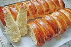 several pieces of bread sitting on top of a pan