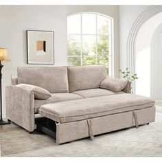 a living room scene with focus on the sofa and chaise - long armrests