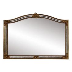 an ornate gold framed mirror on a white wall