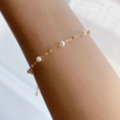 "* DETAILS * * Gold filled bracelet (adjustable from 7\" to 8\") - Freshwater round pearls 4mm - 14k GOLD FILLED Chain - 14K GOLD FILLED Wire - 14k Gold Filled Spring Ring Clasp 5mm - Gold Filled Link Rings & Head Pin ✨All components are gold filled. 👉🏻 You may also like the pearl beaded necklace. Here is the link. https://www.etsy.com/JinnysJewelryBySeJin/listing/901443911/14k-gold-filled-freshwater-pearls-beaded?utm_source=Copy&utm_medium=ListingManager&utm_campaign=Share&utm Droplet Earrings, Sideways Initial Necklace, Pearl Beaded Necklace, Moodboard Aesthetic, June Birthday, Baby Pearls, Bracelet Wedding, Freshwater Pearl Bracelet, Elegant Bracelet