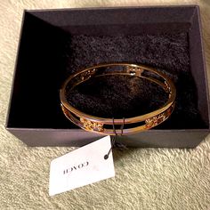 Nwt Coach Gold Bangle Real Gold Bracelets, Luxury Adjustable Bracelet By Coach, Luxury Adjustable Coach Bracelets, Luxury Adjustable Coach Bracelet, Luxury Adjustable Coach Jewelry, Modern Coach Jewelry For Formal Occasions, Chic Coach Bangle Bracelet, Chic Coach Bracelet Jewelry, Chic Coach Bracelet