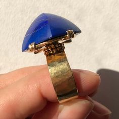 For Sale on 1stDibs - A remarkablly cut and shaped lapis lazuli hard stone and 18 karat gold ring by Jean Després, c. 1940. Stamped with maker's mark & French assay marks. Ring Yellow Gold Lapis Lazuli Ring With Polished Finish, Luxury Lapis Lazuli Cabochon Jewelry, Luxury Lapis Lazuli Rings, Luxury Lapis Lazuli Gemstone Rings, Luxury Lapis Lazuli Jewelry, Jean Despres, Maker's Mark, Makers Mark, Lapis Lazuli