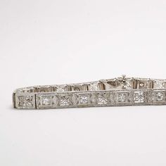 Vintage Filigree Diamond Bracelet | 1.44 Carat Total Weight | Art Deco |  Old European Cut Diamonds Vintage Luxury Tennis Bracelet With Single Cut Diamonds, Luxury Vintage Brilliant Cut Bracelets, Luxury Vintage Diamond Bracelet, Art Deco Formal Tennis Bracelet With Brilliant Cut, Formal Art Deco Tennis Bracelet With Brilliant Cut, Formal Art Deco Brilliant Cut Tennis Bracelet, Formal Art Deco Diamond Tennis Bracelet, Vintage Platinum Diamond Bracelet For Formal Occasions, Art Deco White Gold Tennis Bracelet With 17 Jewels