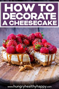 a cheesecake topped with strawberries on top of a wooden cutting board and text overlay reads how to decorate a cheesecake