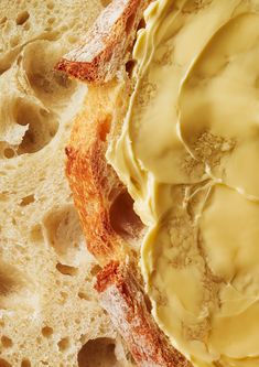 a close up view of some bread with butter on it