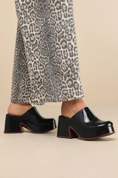 Let everyone know your style is one to watch with the Melissa Mia Black and Brown Platform Mules! Sleek, seamless rubber shapes these instantly iconic mules that have an almond-shaped toe and a flexible, clog-inspired upper. 1.25"" toe platform and chunky block heel boast a cool, brown-toned border to complete the look. Easy, slide-on design. Available in whole sizes only. 3. 5" block heel. Cushioned insole. Rubber sole has nonskid markings. Man Made Materials. Imported. Lulus | Mia Black and Br Chunky Mules Outfit, Chunky Mules, Mules Outfit, Platform Shoe, Platform Mules, Almond Shaped, Chunky Block Heels, Fall Shoes, Mules Shoes