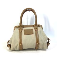 Used Louis Vuitton M48827 Antigua Sac De Nuit Pm Toal Trianon Shoulder Bag Handbag Canvas Leather Women's Beige (Sku: Gzl142g0) === General === Brand : Louis Vuitton Model : M48827 === Design === Type : Handbag, Shoulder Bag Material : Canvas , Leather Color : Beige Closure : Zipper Gender : Women === Size === Size (Hxwxd) : 22cm X 24.5cm X 12cm / 8.66'' X 9.64'' X 4.72'' === Inventory === Serial Number : Sr0025 === Included Items === Accessories Notice : Before Purchasing, Please Refer To The I Skz Charmer, Handbag Model, Used Louis Vuitton, Louis Vuitton Handbag, Boho Macrame, Hair Stylists, Mother Birthday Gifts, Canvas Leather, 50th Birthday